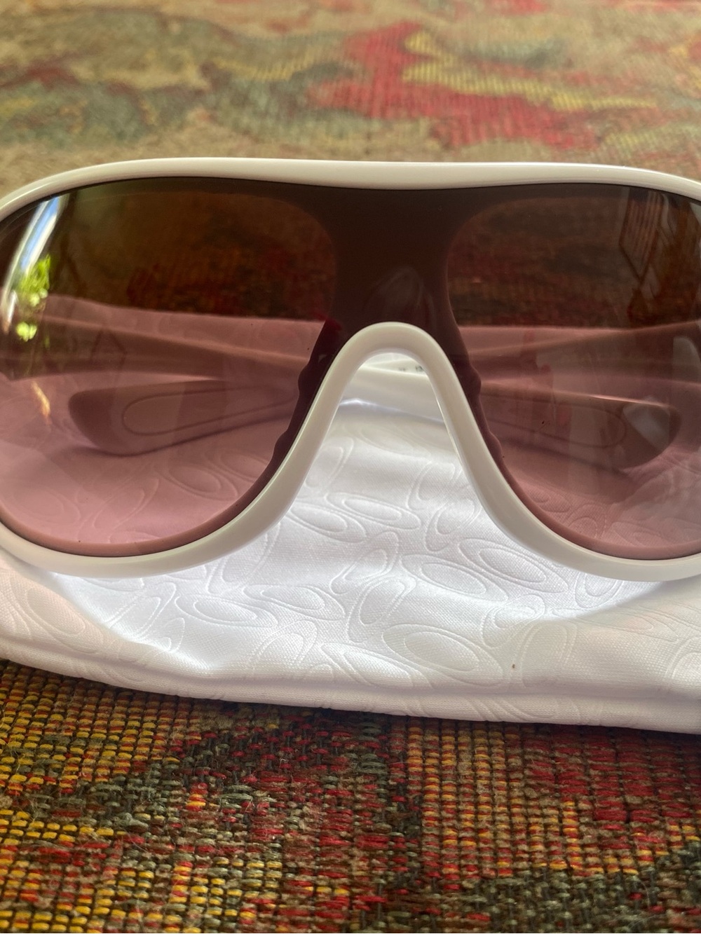 Oakley White Frame Sunglasses with Pink Lenses